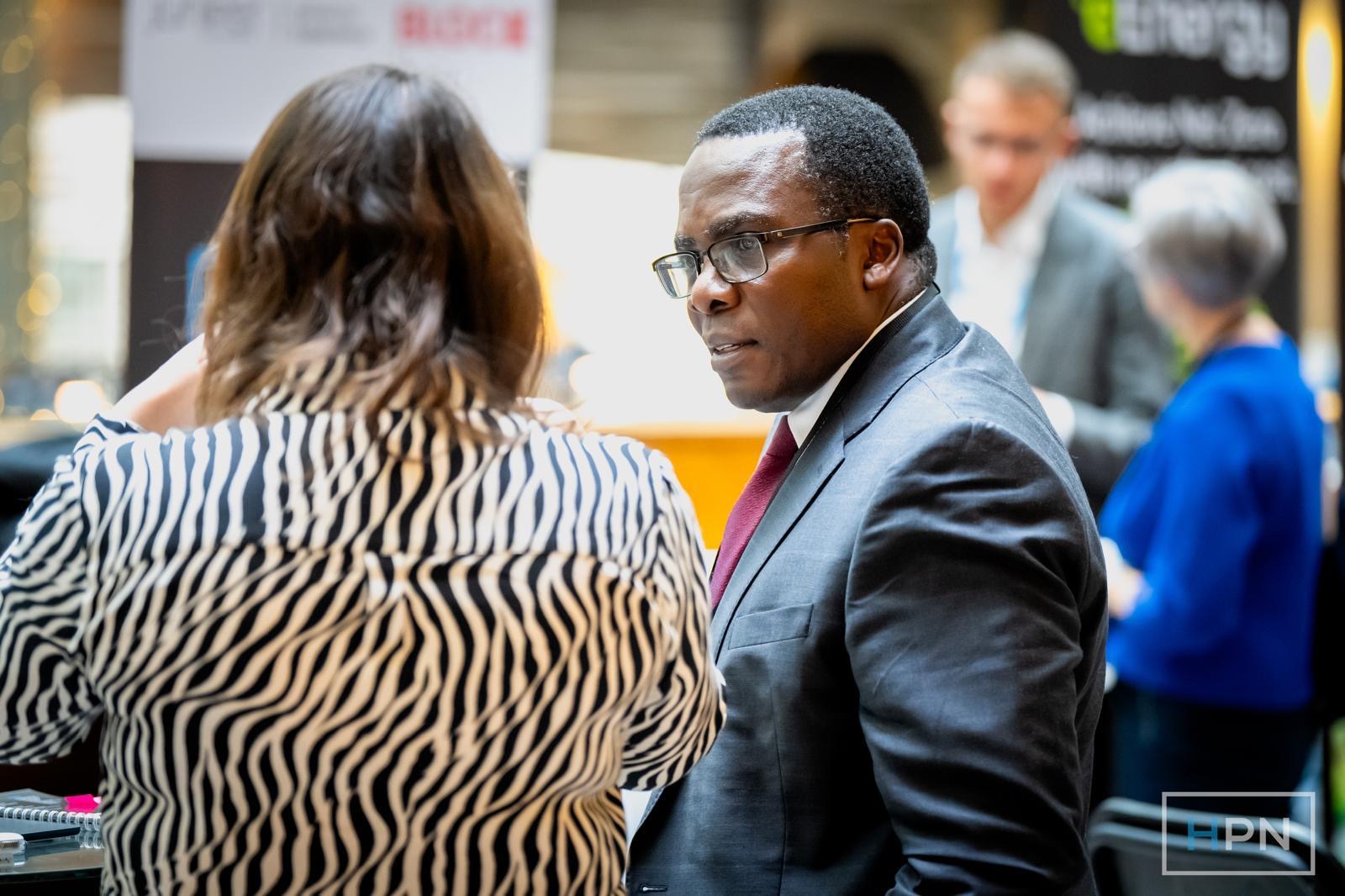 Our CEO in focused discussion at a healthcare event